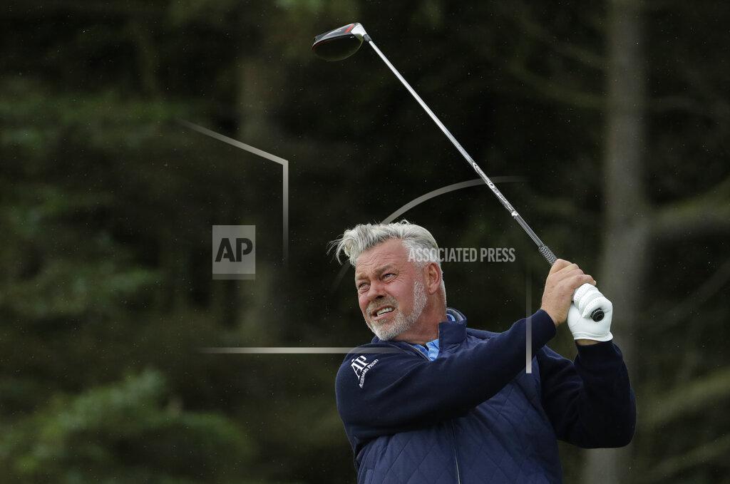 Matt Dunham FILE - In this July 18, 2019, file photo, Northern Ireland's Darren Clarke hits his tee shot on the fifth hole during the first round of the British Open Golf Championships at Royal Portrush in Northern Ireland. Timing was everything for Darren Clarke. He won for the first time on the PGA Tour Champions in the final week before he had to leave the United States because his visa expired. (AP Photo/Matt Dunham, File)