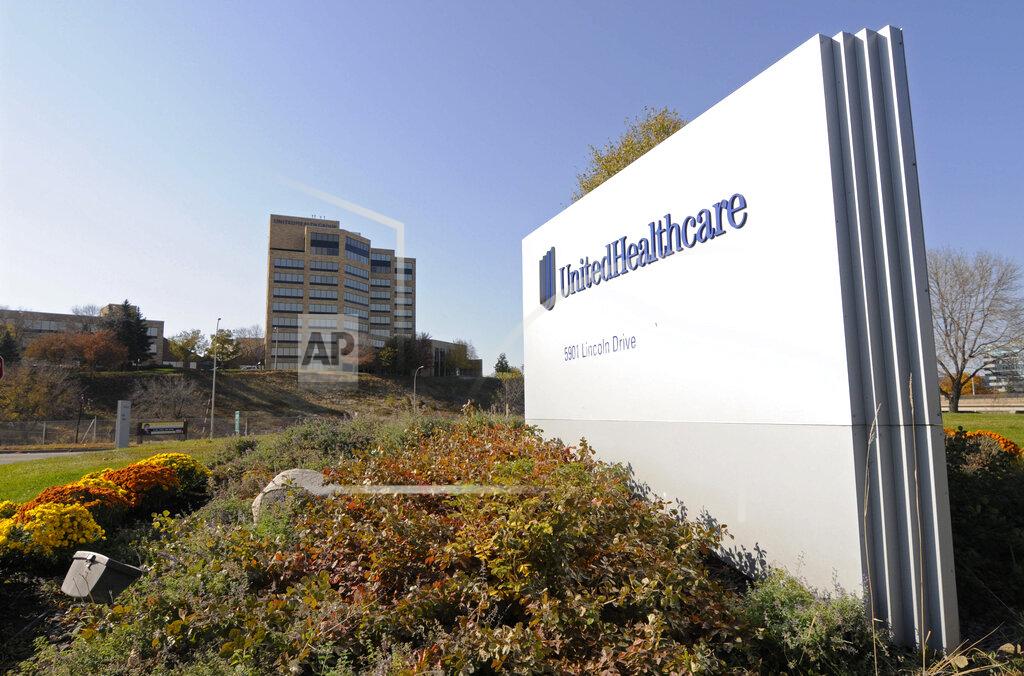 FILE - This Oct. 16, 2012, file photo, shows a portion of the UnitedHealth Group Inc.'s campus in Minnetonka, Minn. UnitedHealth has debuted a lower-than-expected 2021 earnings forecast partly because of COVID-19’s still-foggy impact on the health care system. The nation’s largest health insurance provider said Tuesday, Dec. 1, 2020, that it expects to take a hit from treatment and testing costs tied to the ongoing pandemic. (AP Photo/Jim Mone, File)