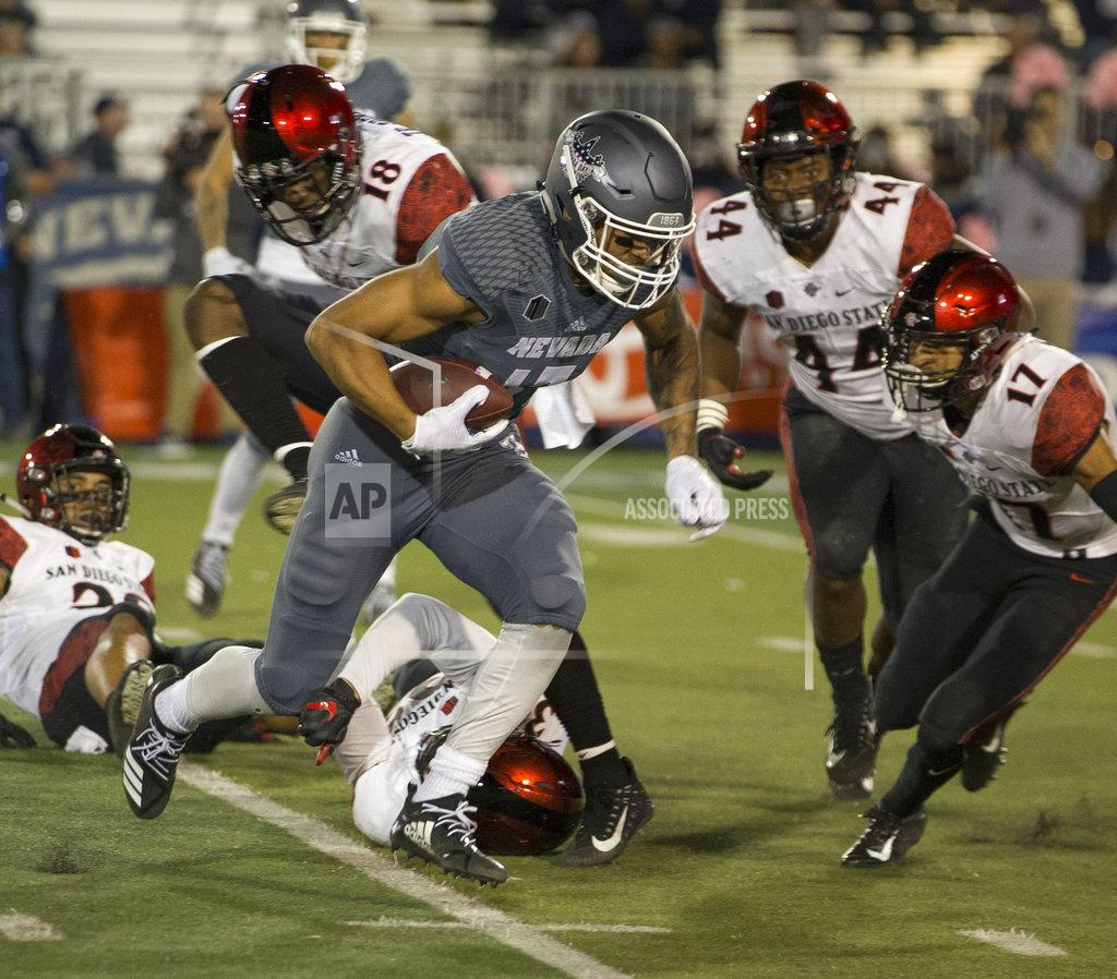 Tom R. Smedes Nevada receiver Brendan O'Leary-Orange (17) runs for a touchdown against San Diego State in the first half of an NCAA college football game in Reno, Nev., Saturday, Oct. 27, 2018. (AP Photo/Tom R. Smedes)