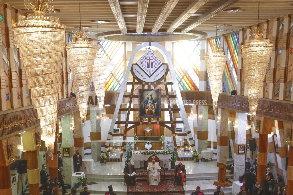 Andrew Medichini Pope Francis delivers his speech during a meeting with bishops and priests, at the Sayidat al-Nejat (Our Lady of Salvation) Cathedral, in Baghdad, Iraq, Friday, March 5, 2021. Pope Francis has arrived in Iraq to urge the country's dwindling number of Christians to stay put and help rebuild the country after years of war and persecution, brushing aside the coronavirus pandemic and security concerns. (AP Photo/Andrew Medichini)