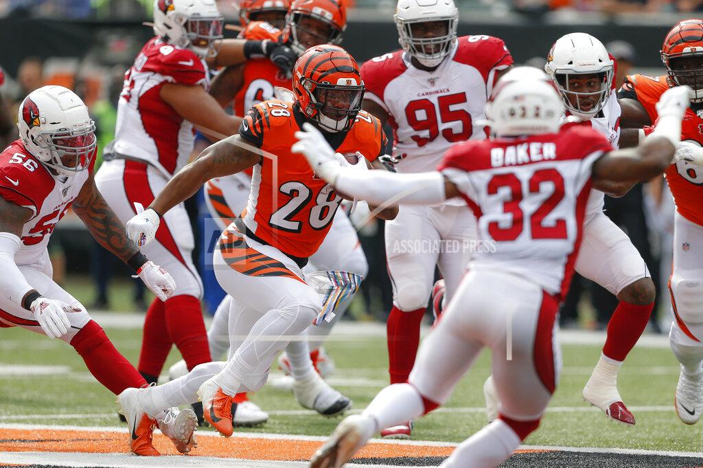 Gary Landers Cincinnati Bengals running back Joe Mixon (28) runs the ball in the first half of an NFL football game against the Arizona Cardinals, Sunday, Oct. 6, 2019, in Cincinnati. (AP Photo/Gary Landers)