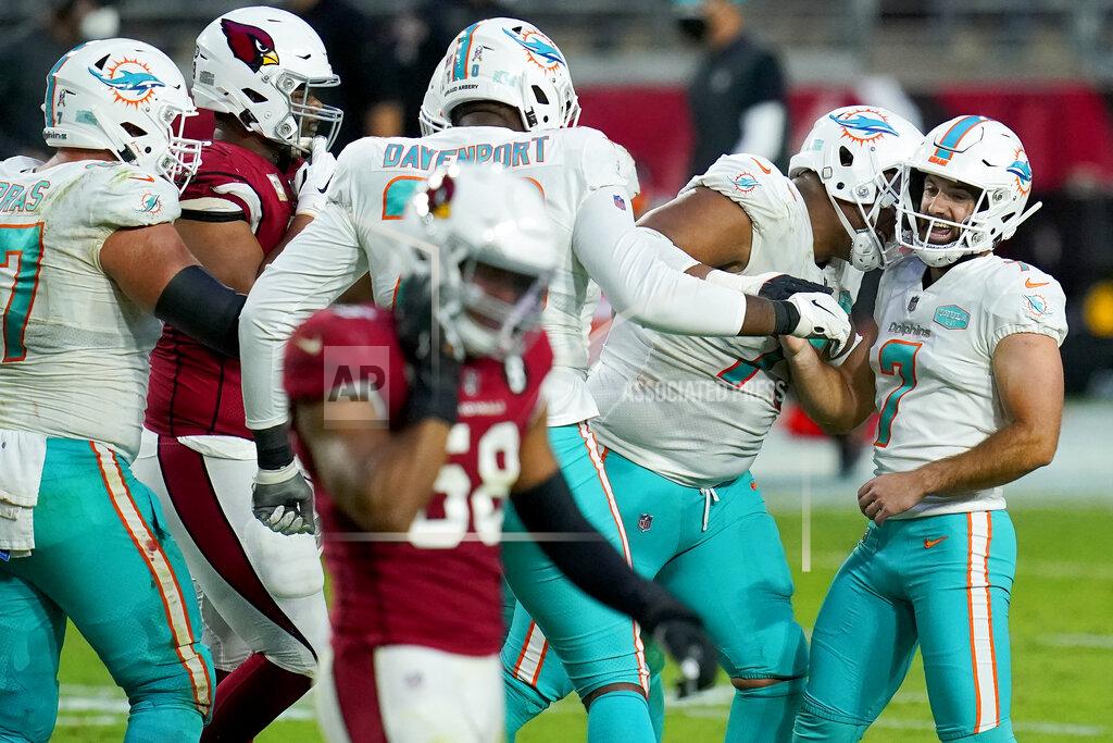 Ross D. Franklin Miami Dolphins kicker Jason Sanders (7) celebrates his field goal with teammates during the second half of an NFL football game against the Arizona Cardinals, Sunday, Nov. 8, 2020, in Glendale, Ariz. (AP Photo/Ross D. Franklin)
