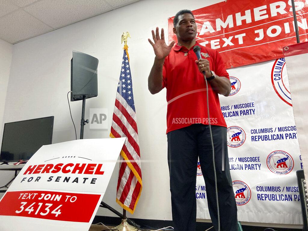 Jeff Amy Georgia Republican Senate candidate Herschel Walker speaks at Muscogee County GOP headquarters on Saturday, May 21, 2022, in Columbus, Ga. Walker defended his work for Patriot Support, a mental health outreach program for military members. (AP Photo/Jeff Amy)