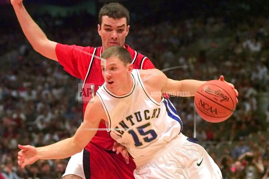 Susan Ragan FILE - In this March 30, 1998, file photo, Kentucky's Jeff Sheppard (15) drives against Utah's Drew Hansen at the NCAA men's Final Four championship game in San Antonio. Kentucky defeated Utah 78-69. Sheppard works as a financial planner now and is over two decades removed from the time he helped Kentucky win the NCAA Tournament. Yet he still gets asked regularly about his role in the Wildcats’ 1998 national championship. (AP Photo/Susan Ragan, File)