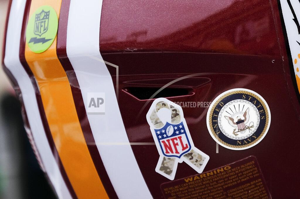 Mark Tenally A Washington Redskins football helmet sits on the turf ahead of the first half of an NFL football game between New York Jets and Washington Redskins, Sunday, Nov. 17, 2019, in Landover, Md. (AP Photo/Mark Tenally)