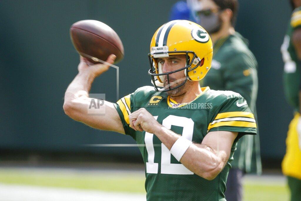 Mike Roemer Green Bay Packers' Aaron Rodgers warms up before an NFL football game against the Detroit Lions Sunday, Sept. 20, 2020, in Green Bay, Wis. (AP Photo/Mike Roemer)