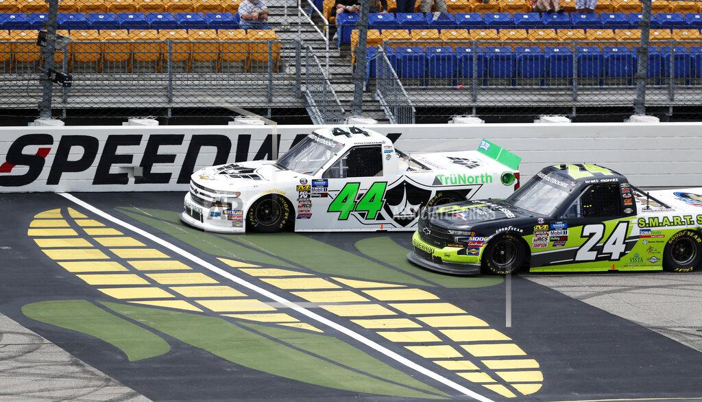 Charlie Neibergall Ross Chastain (44) leads Brett Moffitt (24) during a restart in a NASCAR Truck Series auto race, Sunday, June 16, 2019, at Iowa Speedway in Newton, Iowa. (AP Photo/Charlie Neibergall)