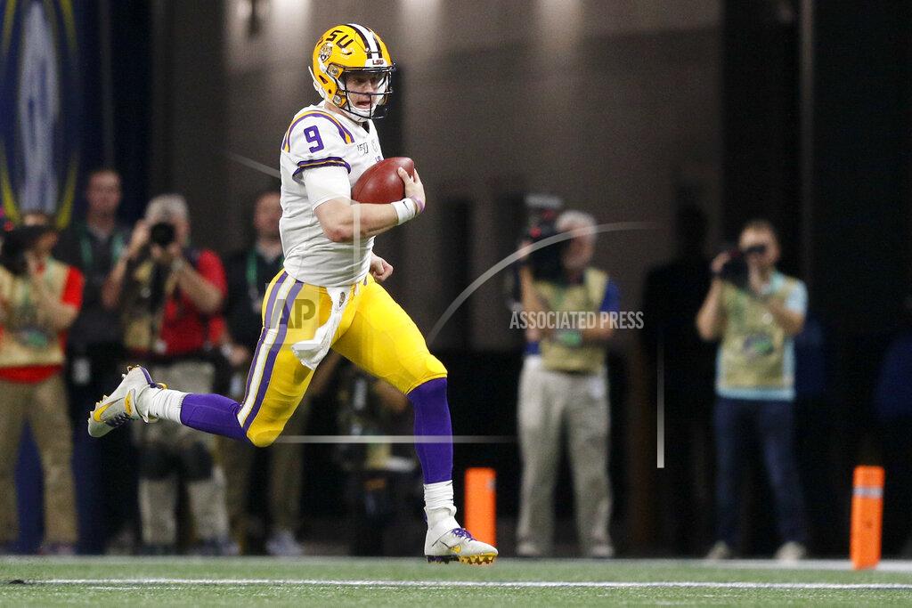 C.b. Schmelter LSU quarterback Joe Burrow (9) runs against Georgia during an NCAA college football game for the Southeastern Conference championship Saturday, Dec. 7, 2019, in Atlanta, Ga. (C.B. Schmelter/Chattanooga Times Free Press via AP)