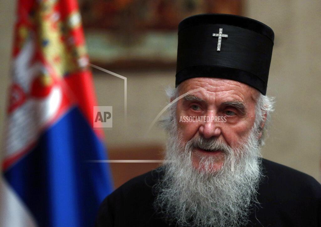 FILE - In this March 15, 2020, file photo, Serbian Patriarch Irinej speaks during a statement with Serbian President Aleksandar Vucic in Belgrade, Serbia. Serbia's Orthodox Church said Friday, Nov. 20, 2020, the leader, Patriarch Irinej, has died after testing positive for the coronavirus. He was 90.(AP Photo/Darko Vojinovic, File)