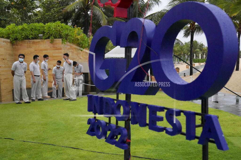 Dita Alangkara Hotel staff prepare a venue for a side event of the G20 Foreign Ministers' Meeting in Nusa Dua, Bali, Indonesia, Thursday, July 7, 2022. Foreign ministers from the Group of 20 leading rich and developing nations are gathering in Indonesia's resort island of Bali for talks bound to be dominated by the conflict in Ukraine despite an agenda focused on global cooperation and food and energy security. (AP Photo/Dita Alangkara)