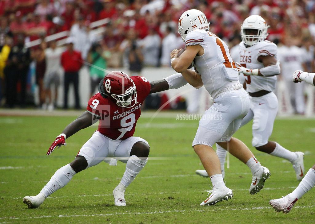 Roger Steinman FILE - in this Oct. 6, 2018, file photo, Oklahoma linebacker Kenneth Murray (9) attempts to tackle Texas quarterback Sam Ehlinger (11) during the first half of an NCAA college football game in Dallas. Eight weeks after that game, the teams meet again. Fifth-ranked Oklahoma plays the ninth-ranked Longhorns in the Big 12 championship game Saturday. “It's one of the greatest rivalries in college football, but this week is about winning a championship and that's what we're focused on,” said Murray, (AP Photo/Roger Steinman, File)