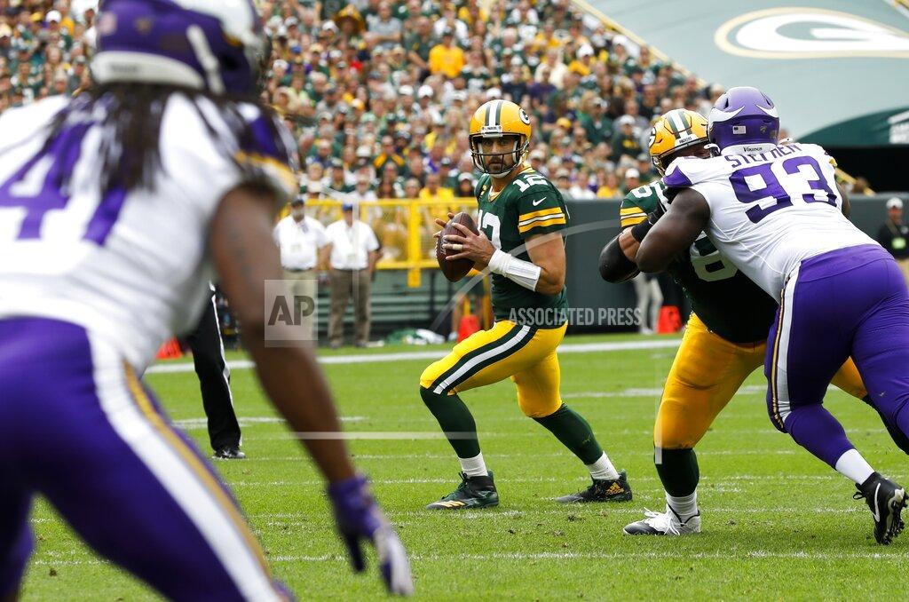 Mike Roemer FILE - Green Bay Packers' Aaron Rodgers throws during the first half of an NFL football game against the Minnesota Vikings, Sunday, Sept. 15, 2019, in Green Bay, Wis. Aaron Rodgers will begin his 16th season with Green Bay looking to continue his remarkable run of success against NFC North opponents as the Packers visit Minnesota. The Packers own a 47-18-1 record in games Rodgers has played against NFC North foes, including a
6-0 mark last season. (AP Photo/Mike Roemer, File)