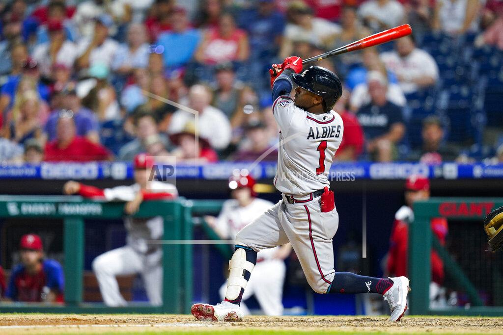 Chris Szagola Atlanta Braves' Ozzie Albies watches his three-run home run during the eighth inning of the team's baseball game against the Philadelphia Phillies, Saturday, July 24, 2021, in Philadelphia. (AP Photo/Chris Szagola)
