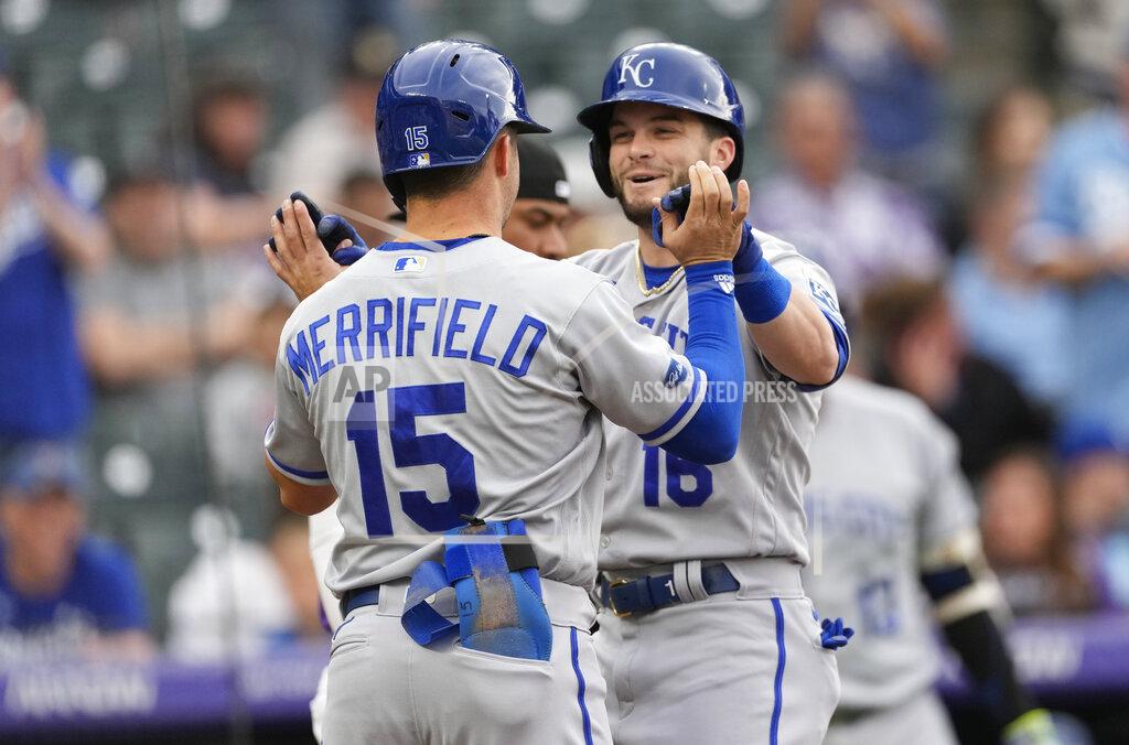 David Zalubowski Kansas City Royals' Whit Merrifield, front, congratulates Andrew Benintendi, who crosses the plate after hitting a two-run home run off Colorado Rockies starting pitcher Kyle Freeland during the first inning of a baseball game Friday, May 13, 2022, in Denver.(AP Photo/David Zalubowski)