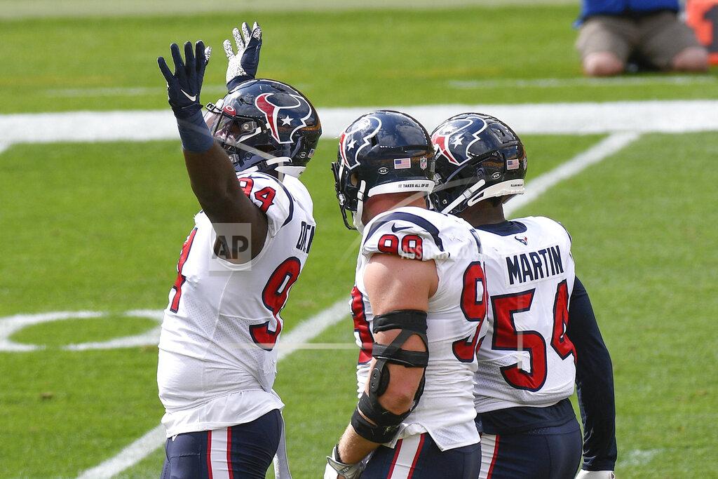 Don Wright Houston Texans' Charles Omenihu (94) celebrates with teammates after they sacked Pittsburgh Steelers quarterback Ben Roethlisberger during the first half of an NFL football game, Sunday, Sept. 27, 2020, in Pittsburgh. (AP Photo/Don Wright)