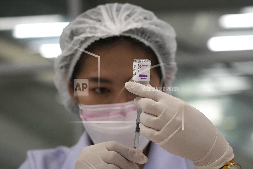 Sakchai Lalit A health worker prepares a shot of the AstraZeneca COVID-19 vaccine for people at the Central Vaccination Center in Bangkok, Thailand, Thursday, July 22, 2021. (AP Photo/Sakchai Lalit)