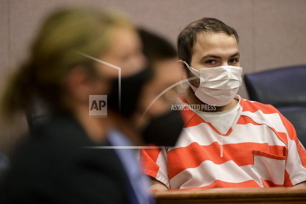 Matthew Jonas Ahmad Al Aliwi Alissa appears in a Boulder County District courtroom in Boulder, Colo., on Tuesday, May 25, 2021. The 22-year-old man accused of fatally shooting 10 people at a Colorado supermarket appeared in court Tuesday for a hearing to discuss what will happen next in the case. The status hearing will be only the second court appearance for Ahmad Al Aliwi Alissa since the March 22 attack in Boulder. (Matthew Jonas/Boulder Daily Camera via AP, Pool)