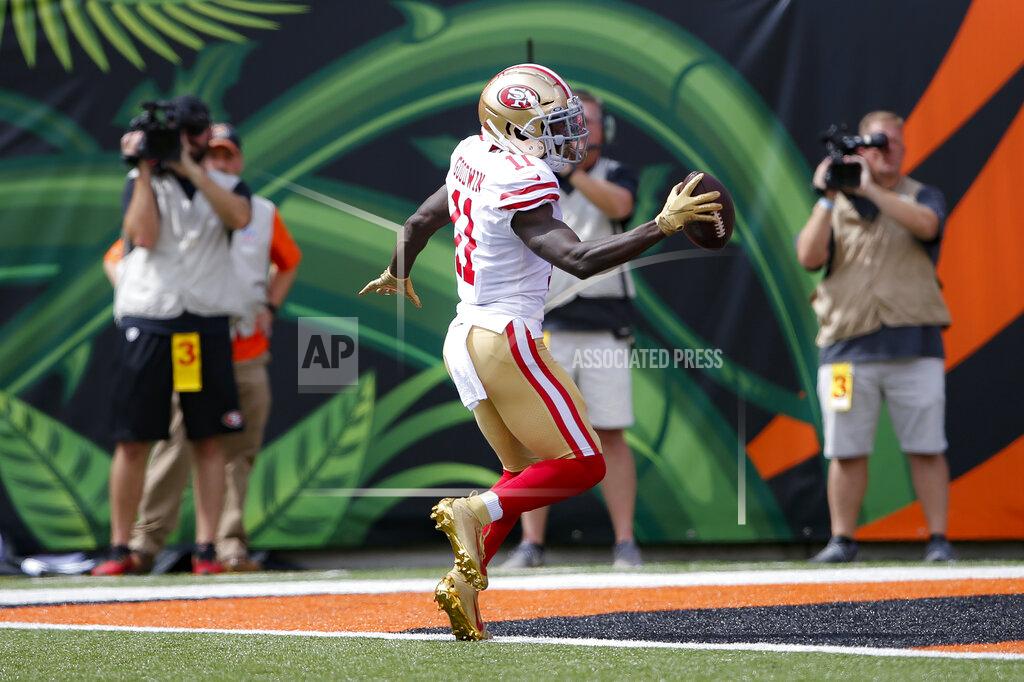 Gary Landers San Francisco 49ers wide receiver Marquise Goodwin (11) runs in a touchdown during the first half an NFL football game against the Cincinnati Bengals, Sunday, Sept. 15, 2019, in Cincinnati. (AP Photo/Gary Landers)