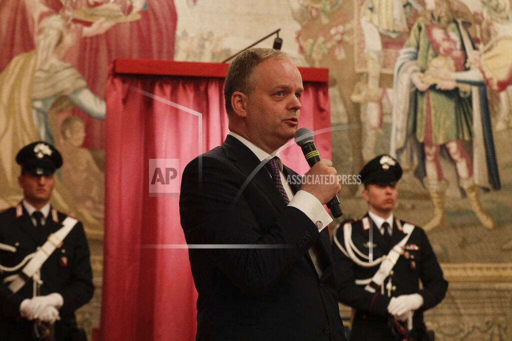 Gregorio Borgia FILE - In this July 19, 2019 file photo, director of the Uffizi Gallery Eike Schmidt speaks during the unveiling ceremony of the "Vase of Flowers" painting by Jan van Huysum, at the Pitti Palace, part of the Uffizi Galleries, in Florence, Italy. On Monday, April 20, 2020, Italy was completing its sixth week of nationwide lockdown with at least two more weeks to go, as part of government efforts to contain the spread of COVID-19. Schmidt expects a boom in visitors after pandemic restrictions end, judging by the experience after previous emergencies closed down one of the world’s most popular museums. (AP Photo/Gregorio Borgia, file)