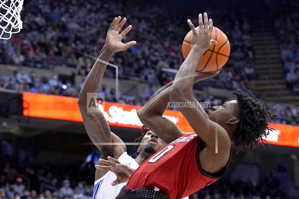 Gerry Broome North Carolina guard Leaky Black defends against North Carolina State guard Terquavion Smith (0) during the second half of an NCAA college basketball game in Chapel Hill, N.C., Saturday, Jan. 29, 2022. (AP Photo/Gerry Broome)
