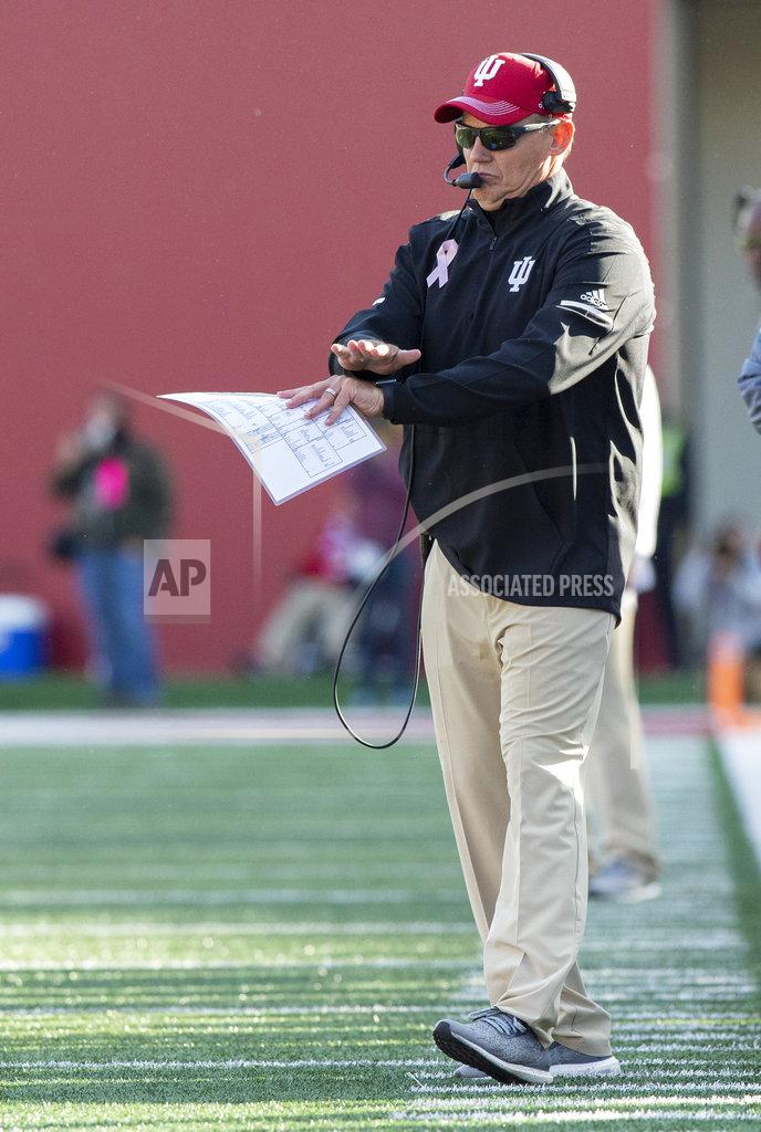 Doug Mcschooler Indiana head coach Tom Allen signals to game officials that they will decline a penalty called against Penn State during the first half of an NCAA college football game Saturday, Oct. 20, 2018, in Bloomington, Ind. (AP Photo/Doug McSchooler)
