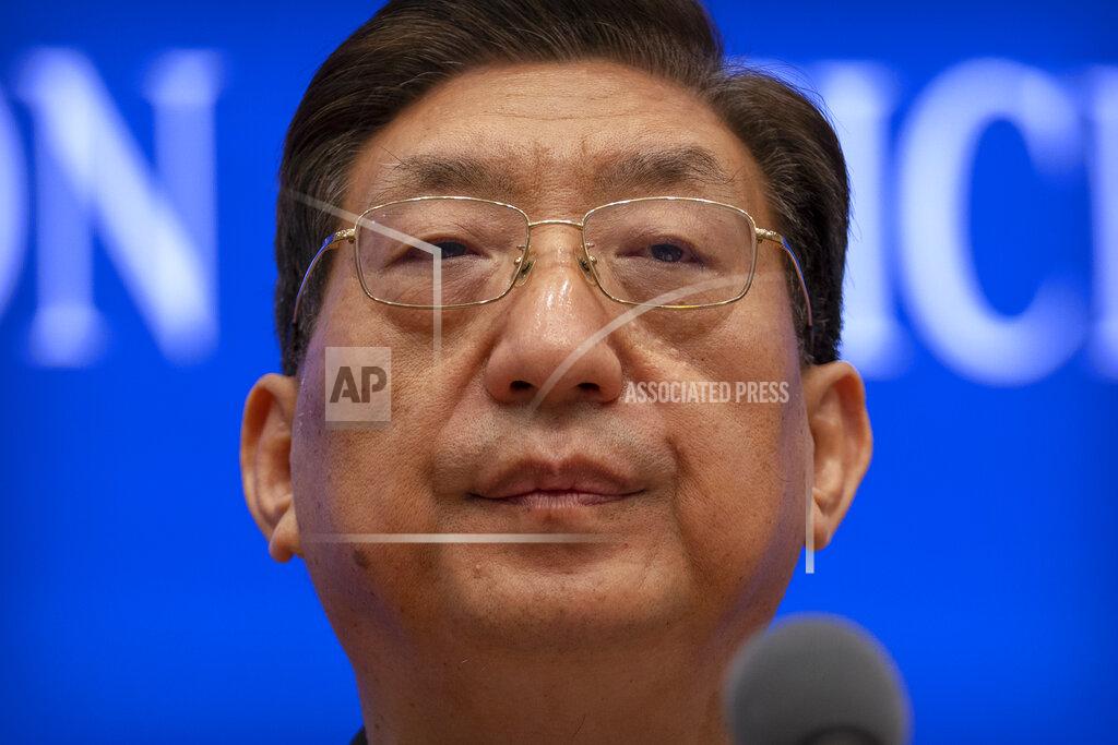 Mark Schiefelbein Zeng Yixin, Vice Minister of China's National Health Commission, speaks at a press conference at the State Council Information Office in Beijing, Thursday, July 22, 2021. China cannot accept the World Health Organization's plan for the second phase of a study into the origins of COVID-19, a senior Chinese health official said Thursday. (AP Photo/Mark Schiefelbein)