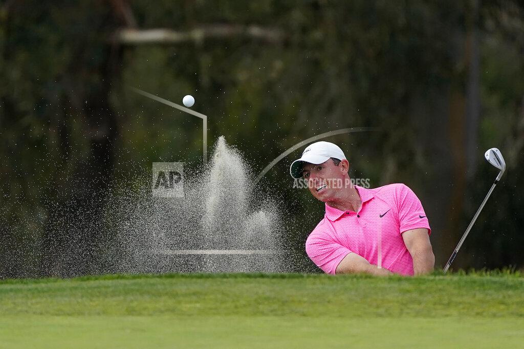 Gregory Bull Rory McIlroy, of Northern Ireland, hits out of a bunker to the 13th green on the South Course during the final round of the Farmers Insurance Open golf tournament at Torrey Pines, Sunday, Jan. 31, 2021, in San Diego. (AP Photo/Gregory Bull)