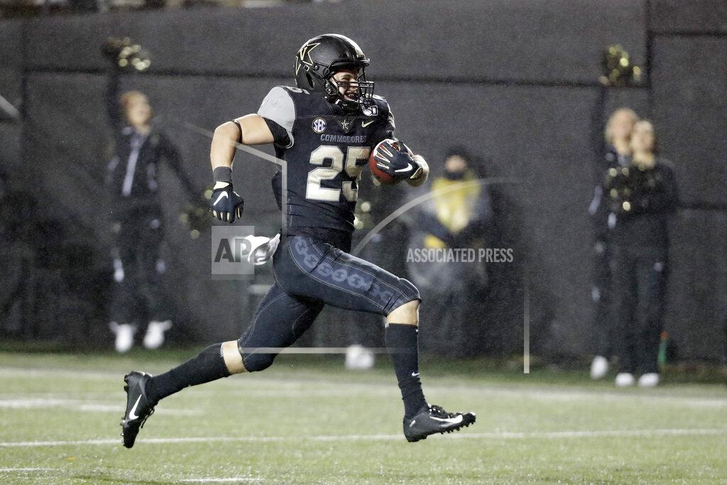 Mark Humphrey Vanderbilt running back Mitchell Pryor runs 31 yards for a touchdown against ETSU in the second half of an NCAA college football game Saturday, Nov. 23, 2019, in Nashville, Tenn. Vanderbilt won 38-0. (AP Photo/Mark Humphrey)