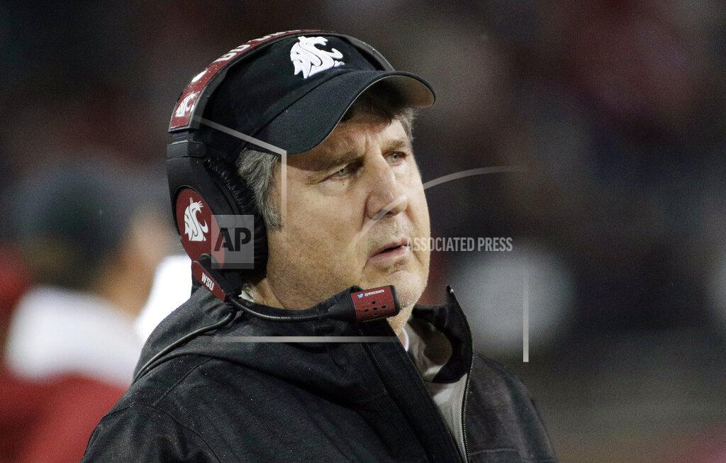 Young Kwak FILE - In this Nov. 3, 2018, file photo, Washington State head coach Mike Leach watches during the second half of an NCAA college football game against California in Pullman, Wash. Washington State and Leach have agreed on a one-year contract extension that runs through the 2023 season, the school said, Wednesday, Jan. 30, 2019. (AP Photo/Young Kwak, File)