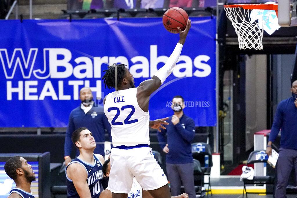 Mary Altaffer Seton Hall guard Myles Cale (22) goes to the basket past Villanova forward Cole Swider (10) during the first half of an NCAA college basketball game, Saturday, Jan. 30, 2021, in Newark, N.J. (AP Photo/Mary Altaffer)