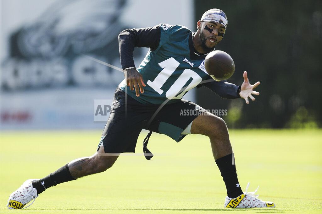 FILE - In this July 26, 2019, file photo, Philadelphia Eagles wide receiver DeSean Jackson catches a pass during practice at the NFL football team's training camp in Philadelphia. Jackson joining Alshon Jeffrey and Nelson Agholor gives the team a deep threat who will open the field underneath for everyone else. (AP Photo/Matt Rourke, File)