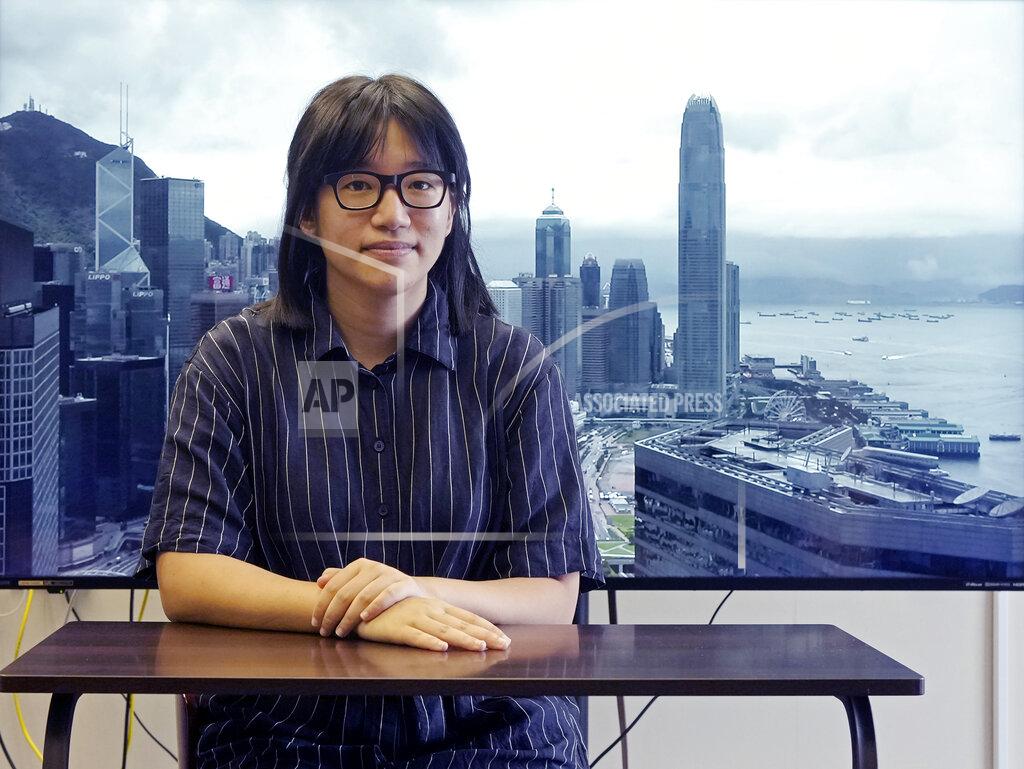 Vincent Yu In this Monday, May 24, 2021, photo, Chow Hang Tung, Vice Chairperson of the Hong Kong Alliance in Support of the Democratic Patriotic Movements of China poses after an interview in Hong Kong. Hong Kong police on Friday, June 4, arrested the committee member that organizes the city's annual June 4 museum and candlelight vigil, on the 32nd anniversary of a bloody military crackdown on pro-democracy protesters in Beijing's Tiananmen Square, according to local media reports. (AP Photo/Vincent Yu)