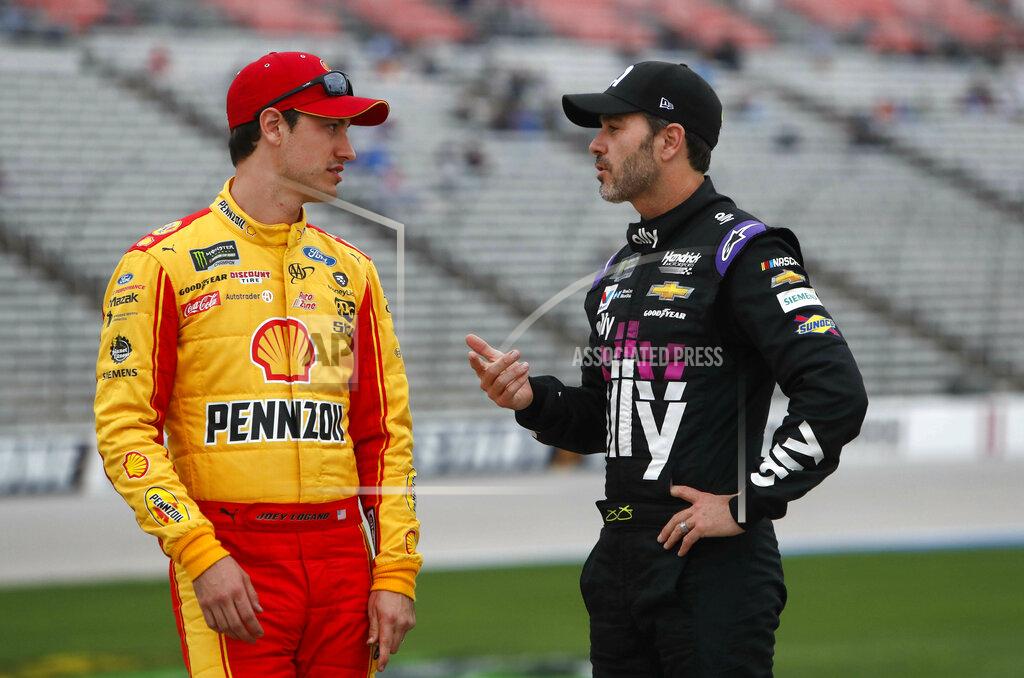 Lm Otero Jimmie Johnson, right, chats with Joey Logano before qualifying for the NASCAR Cup Series auto race at Texas Motor Speedway in Fort Worth, Texas, Friday, March 29, 2019. (AP Photo/LM Otero)
