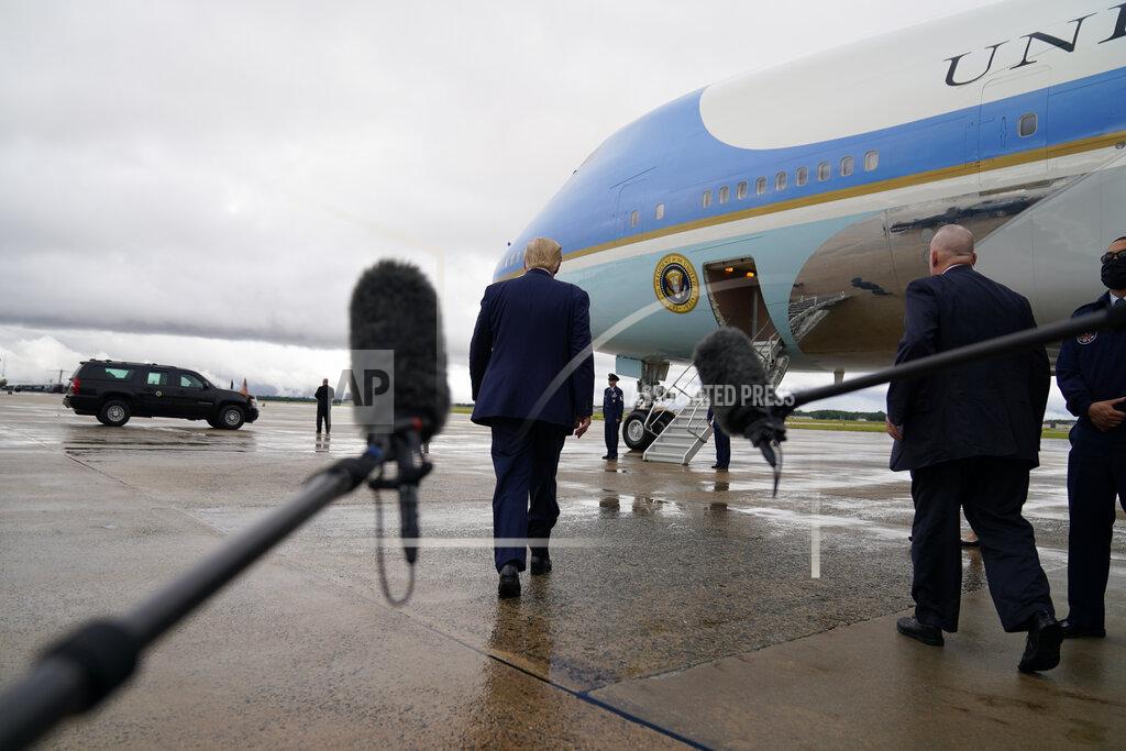 Evan Vucci FILE - In this Sept. 10, 2020, file photo President Donald Trump boards Air Force One for a trip to a campaign rally in Freeland, Mich., in Andrews Air Force Base, Md. (AP Photo/Evan Vucci, File)