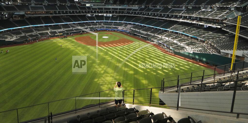 Lm Otero In this photo made Thursday, July 23, 2020, an upper deck view of the new Texas Rangers home baseball stadium named Globe Life Field is seen in Arlington, Texas. The Texas Rangers' new stadium isn't retro and designers wanted the first next-generation ballpark. There is the full-panel retractable roof, the split seating levels offering full views of the ballpark with plenty of natural light. (AP Photo/LM Otero)