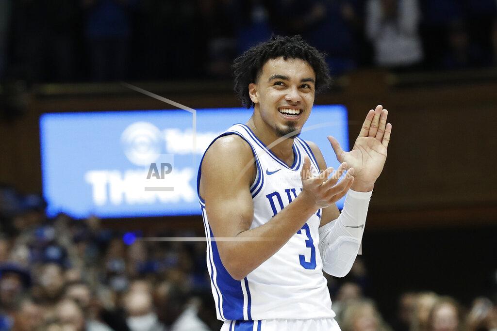 Gerry Broome FILE - In this March 7, 2020, file photo, Duke guard Tre Jones (3) reacts during the second half of an NCAA college basketball game against North Carolina in Durham, N.C. Jones said Saturday, March 21, 2020, that he will enter the NBA draft. The point guard was chosen for named to the third team of The Associated Press All-America team on Friday. (AP Photo/Gerry Broome, File)
