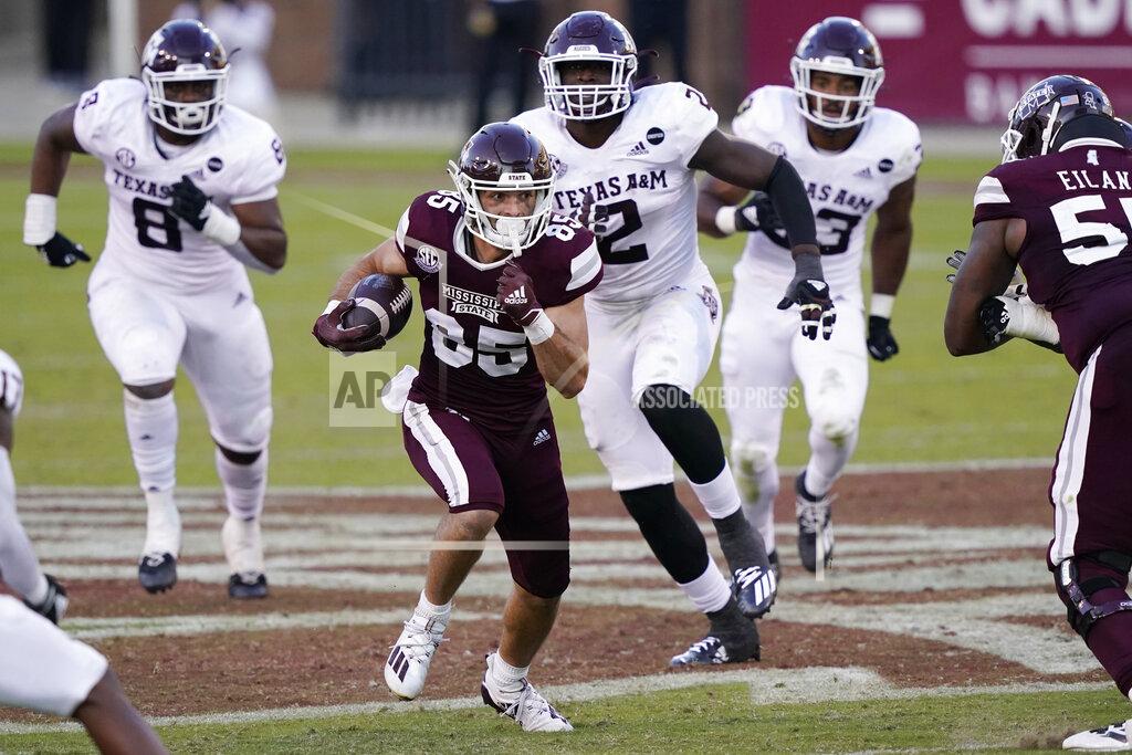 Rogelio V. Solis Texas A&M defenders run after Mississippi State wide receiver Austin Williams (85) as he heads upfield with a first down pass reception during the second half of an NCAA college football game in Starkville, Miss., Saturday, Oct. 17, 2020. (AP Photo/Rogelio V. Solis)