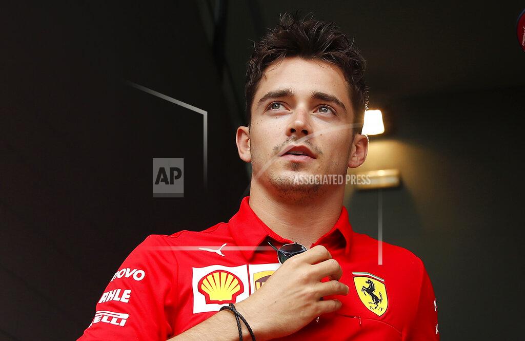 Ferrari driver Charles Leclerc, of Monaco, stands in the paddock, at the Monza racetrack, in Monza, Italy, Thursday, Sept. 5, 2019. The Formula one GP will be held on Sunday. (AP Photo/Antonio Calanni)