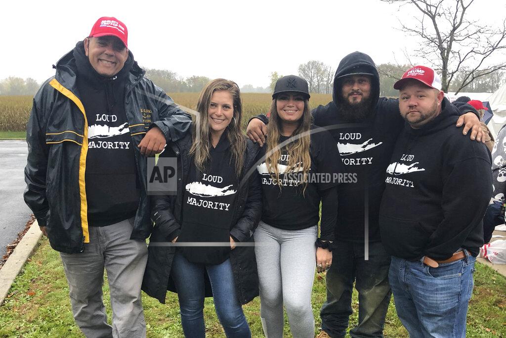 Jill Colvin Matt Vereline, left, and other members of "Long Island Loud Majority" at a pre-election Trump rally in Lititz, Pa., on Oct. 26, 2020. Vereline, a member of the pro-Trump group “Long Island Loud Majority” is not in the mood of reconciliation. Vereline, who live Bohemia, N.Y., is convinced “there was a lot more voter fraud than we know about,” though he's not sure whether it changed the outcome. But that won't keep him from rallying around what he thinks was an injustice. After all, that's what Democrats did to Trump, he says. (AP Photo/Jill Colvin)