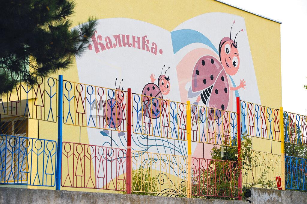 Vadim Ghirda Ladybirds are painted on the wall of a kindergarten in a village on the outskirts of Burgas, Bulgaria, Monday, Sept. 28, 2020. Human rights activists and experts say local officials in several countries with significant Roma populations have used the pandemic to unlawfully target the minority group, which is Europe's largest and has faced centuries of severe discrimination. In Bulgaria, Roma communities were sprayed with disinfectant from crop dusters this spring as coronavirus cases surged in the country. (AP Photo/Vadim Ghirda)