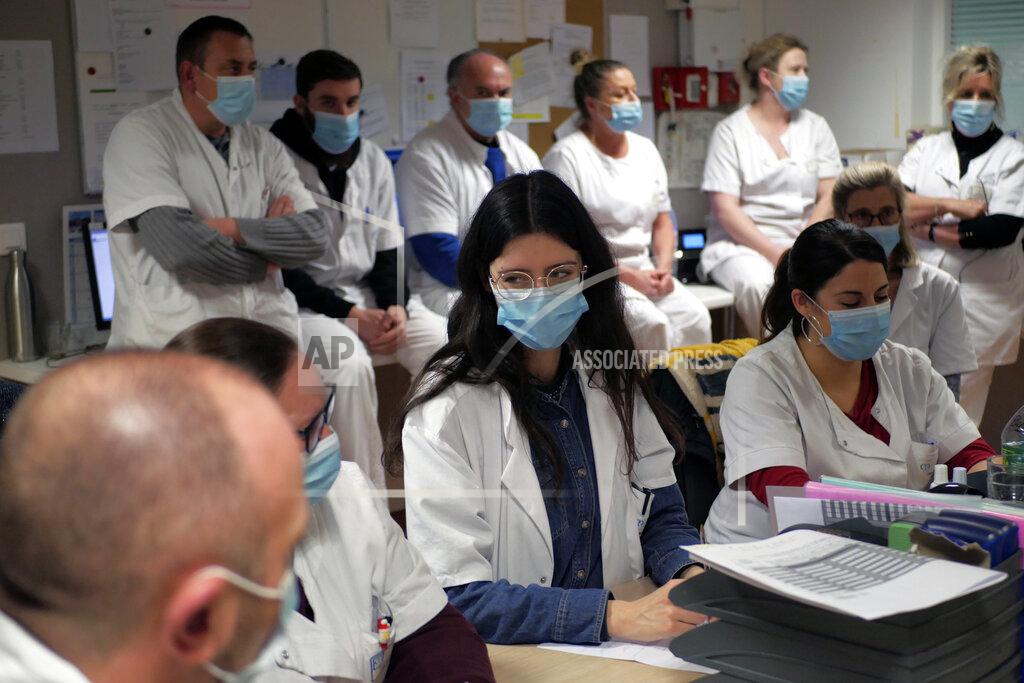 Thibault Camus Medical staff attend a team meeting at the emergency ward of the Rouvray psychiatric hospital, in Rouen, western France, Wednesday, Nov. 25, 2020. Lockdowns that France has used to fight the coronavirus have come at considerable cost to mental health. Surveying points to a surge of depression most acute among people without work, in financial hardship and young adults. (AP Photo/Thibault Camus)