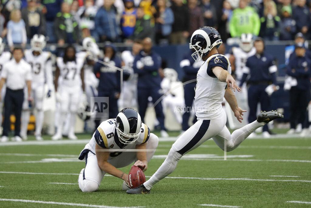 Elaine Thompson With Johnny Hekker holding, Los Angeles Rams' Greg Zuerlein kicks a field goal during the first half of the team's NFL football game against the Seattle Seahawks, Thursday, Oct. 3, 2019, in Seattle. (AP Photo/Elaine Thompson)