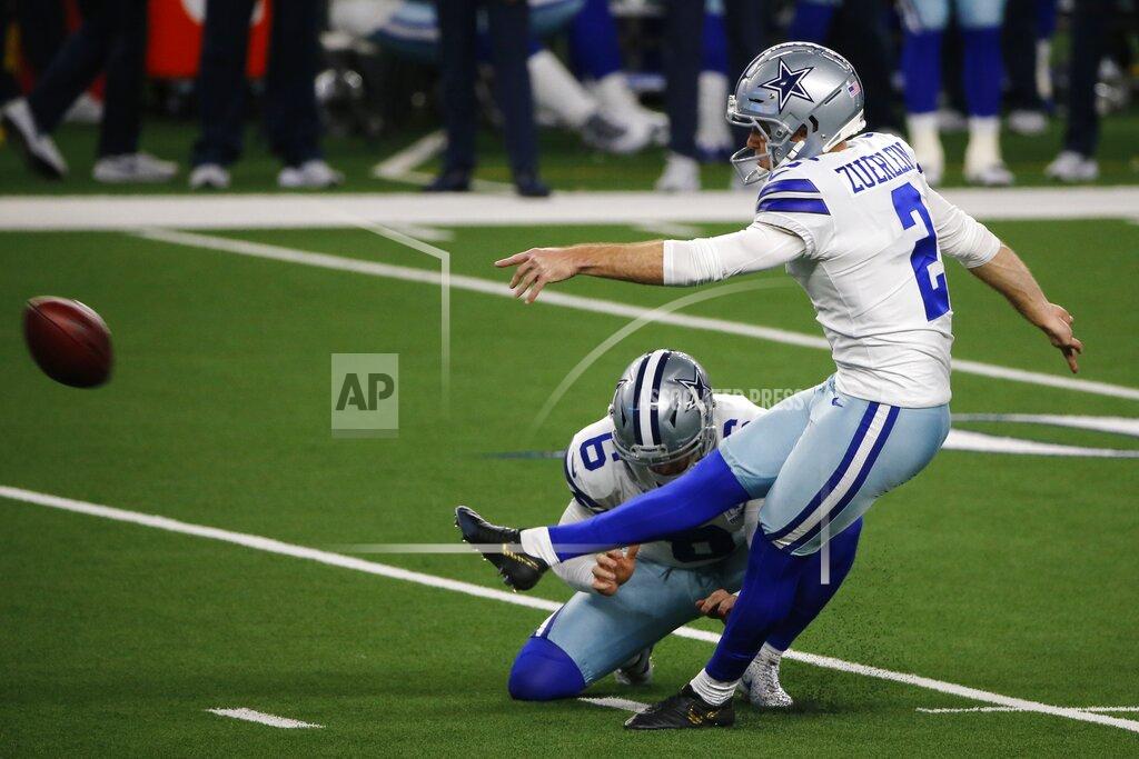 Michael Ainsworth Dallas Cowboys' Chris Jones (6) holds as place kicker Greg Zuerlein (2) kicks a field goal in the first half of an NFL football game against the Arizona Cardinals in Arlington, Texas, Monday, Oct. 19, 2020. (AP Photo/Michael Ainsworth)