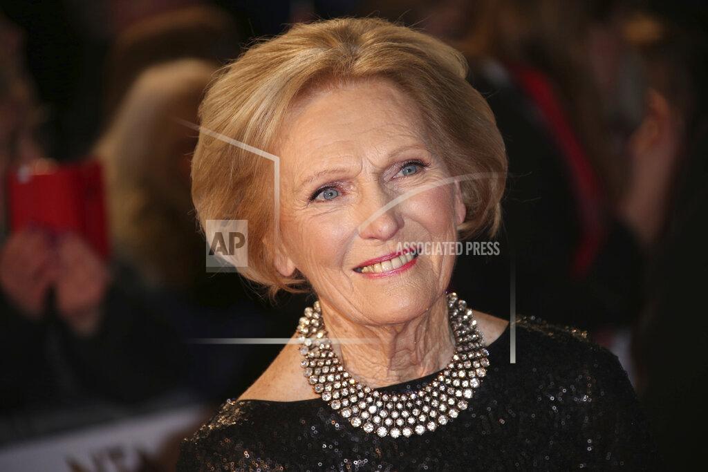 Joel Ryan FILE - In this Wednesday, Jan. 20, 2016 file photo, Mary Berry poses for photographers upon arrival at the National Television Awards in London. Berry, the food writer and former judge of the hugely popular Great British Bake Off has been made a dame in the Queen's Birthday honor list is was announced late Friday, Oct. 9, 2020. (Photo by Joel Ryan/Invision/AP, File)
