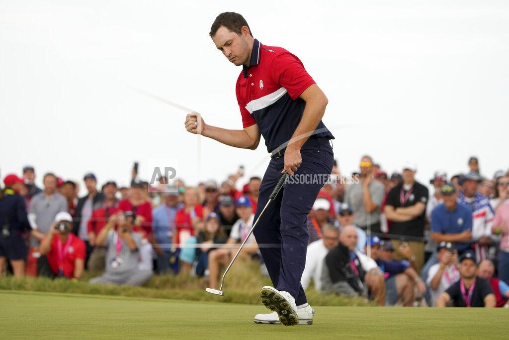 Charlie Neibergall Team USA's Patrick Cantlay makes a putt on the 15th hole during a Ryder Cup singles match at the Whistling Straits Golf Course Sunday, Sept. 26, 2021, in Sheboygan, Wis. (AP Photo/Charlie Neibergall)