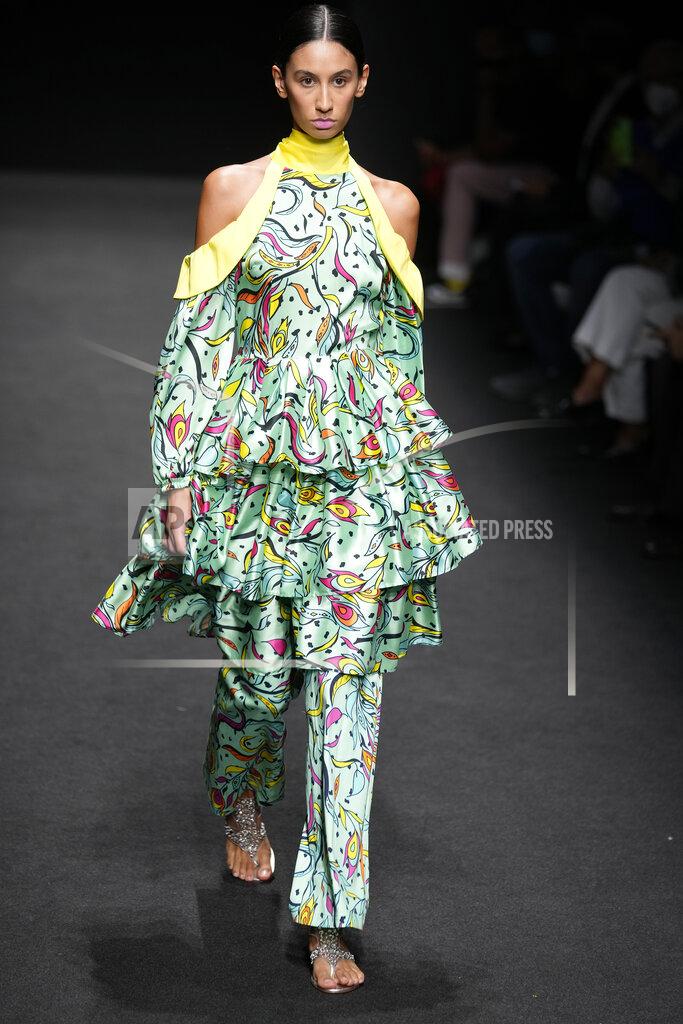Luca Bruno A model wears a creation of Joy Meribe's Spring Summer 2022 collection, unveiled during the Milan Fashion Week, in Milan, Italy, Wednesday, Sept. 22, 2021. (AP Photo/Luca Bruno)