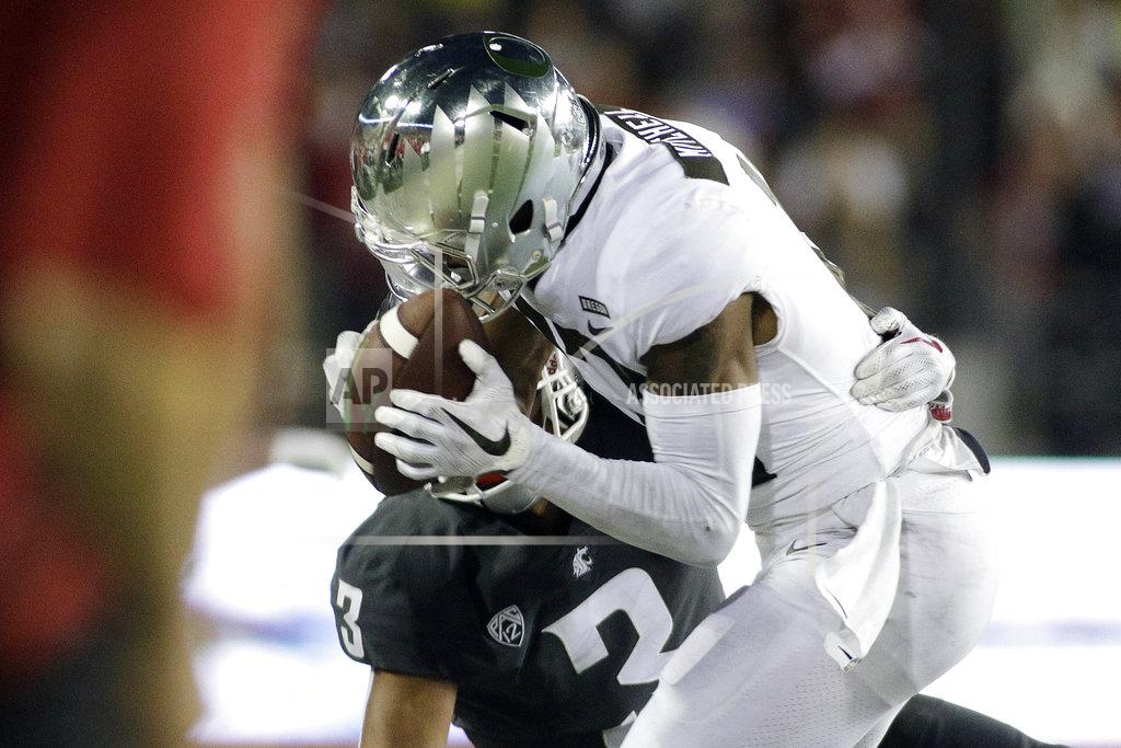 Young Kwak Oregon wide receiver Dillon Mitchell, right, catches a pass while defended by Washington State cornerback Darrien Molton (3) during the second half of an NCAA college football game in Pullman, Wash., Saturday, Oct. 20, 2018. Washington State won 34-20. (AP Photo/Young Kwak)
