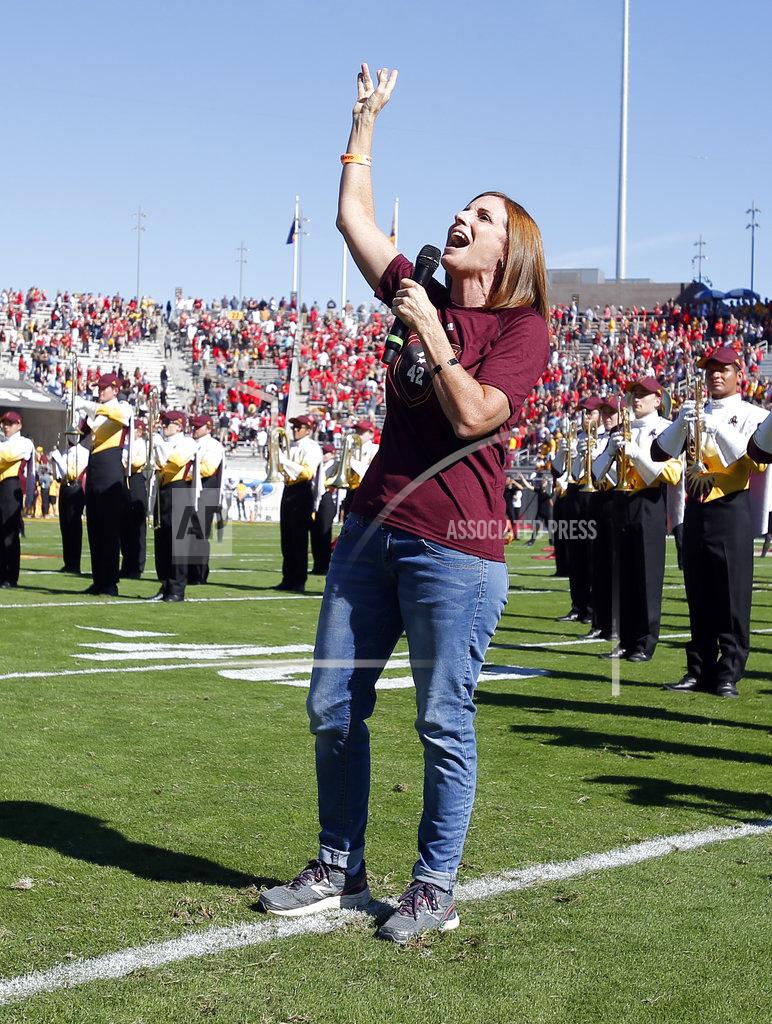 Rick Scuteri U.S. Rep. Martha McSally, R-Ariz. sings the national anthem before an NCAA college football game between Arizona State and Utah, Saturday, Nov. 3, 2018, in Tempe, Ariz. (AP Photo/Rick Scuteri)