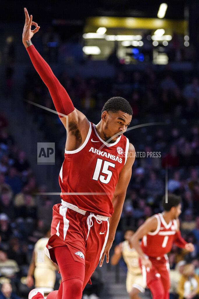 Danny Karnik Arkansas guard Mason Jones (15) celebrates in the first half of an NCAA college basketball game against Georgia Tech, Monday, Nov. 25, 2019, in Atlanta. (AP Photo/Danny Karnik)