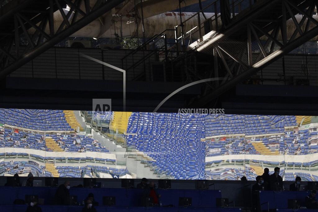 Gregorio Borgia The empty seats of the Olympic stadium are reflected on the windows of the press center during the Italian Serie A soccer match between Lazio and Sampdoria at Rome's Olympic stadium, Saturday, Feb. 20, 2021. (AP Photo/Gregorio Borgia)